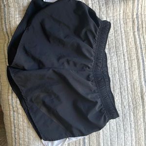 Black Nike running shorts